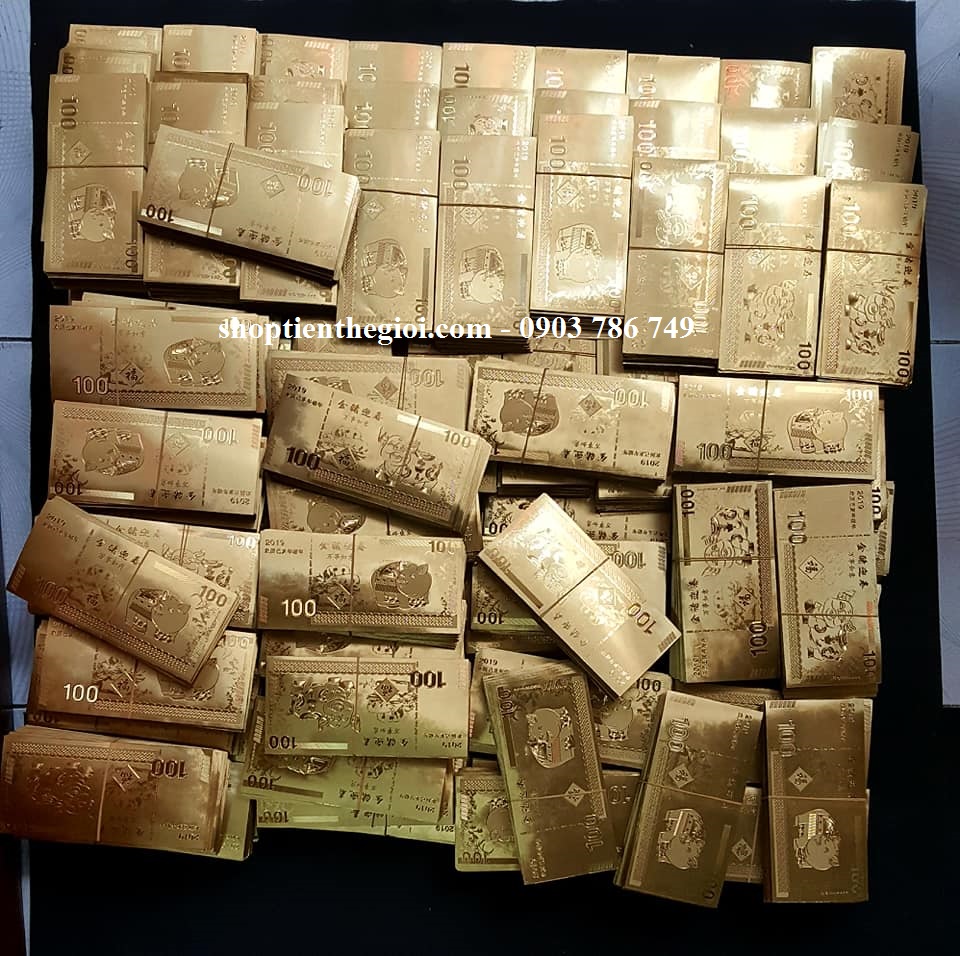 Tiền con heo mạ vàng