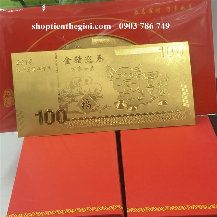 Tiền con heo mạ vàng