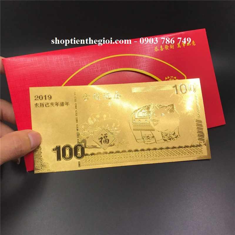 Tiền con heo mạ vàng